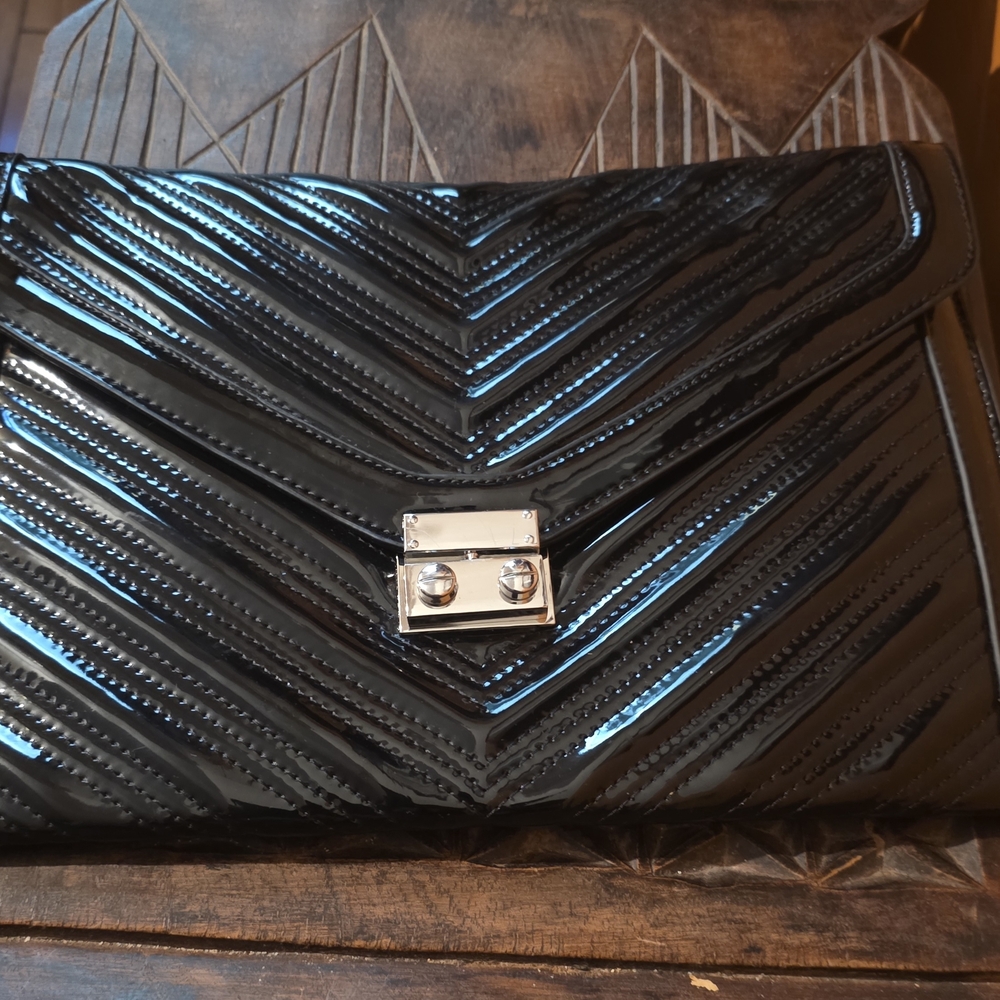 BCBGeneration Black Patent Quilted Chevron Clutch with Silver Lock